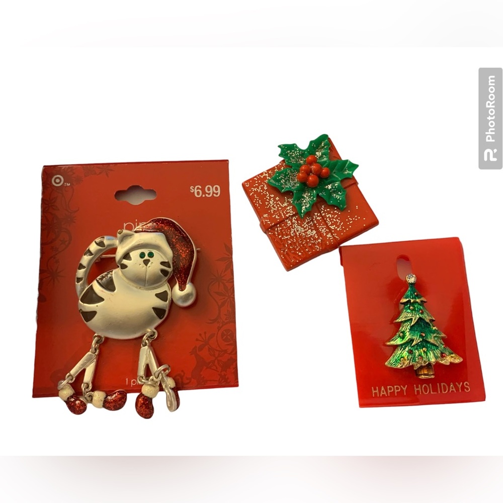 Set of 3 Holiday Pins featuring a gift, a Santa cat, and a Christmas Tree